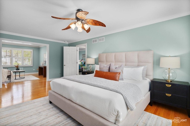 1454 Rill Ct, Naperville, IL 60565 - bedroom with ceiling fan, visible vents, wood finished floors, baseboards, and ornamental molding