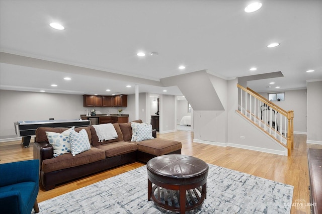 1454 Rill Ct, Naperville, IL 60565 - living area with baseboards, wet bar, light wood finished floors, and stairway