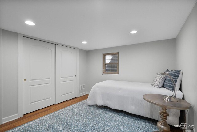 1454 Rill Ct, Naperville, IL 60565 - bedroom featuring recessed lighting, baseboards, wood finished floors, and a closet