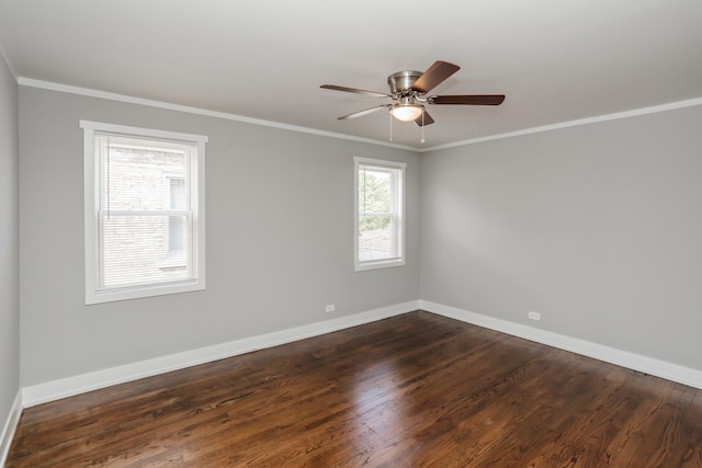 unfurnished room with ceiling fan, baseboards, dark wood-type flooring, and ornamental molding
