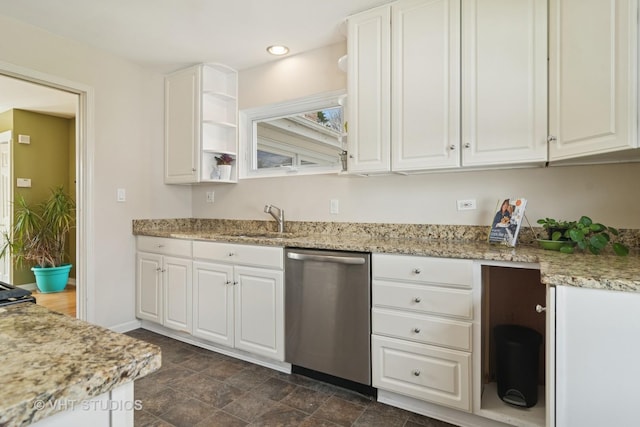 kitchen featuring stainless steel dishwasher, a sink, open shelves, and white cabinetry