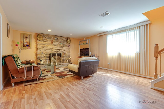 1338 E Best Dr, Arlington Heights, IL 60004 - living area featuring recessed lighting, visible vents, a stone fireplace, and wood finished floors