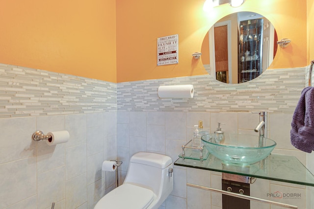 1338 E Best Dr, Arlington Heights, IL 60004 - half bathroom featuring vanity, toilet, and tile walls