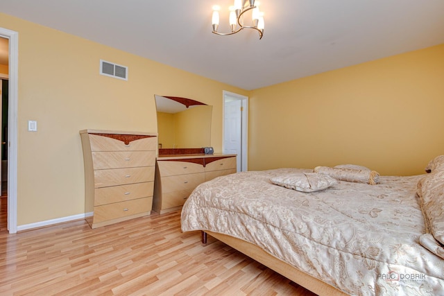 1338 E Best Dr, Arlington Heights, IL 60004 - bedroom featuring an inviting chandelier, visible vents, light wood-style flooring, and baseboards