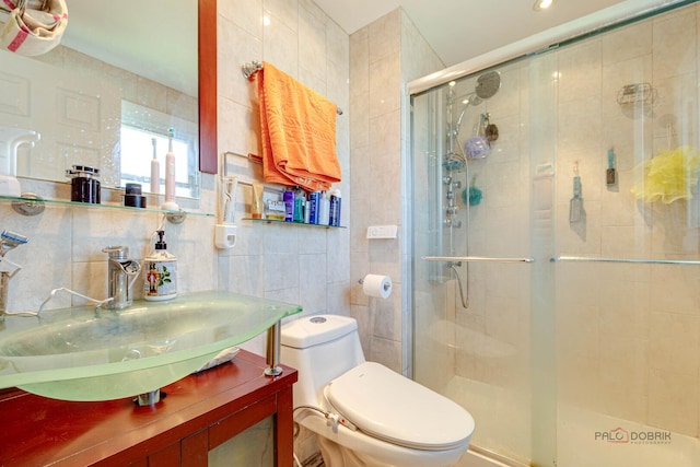 1338 E Best Dr, Arlington Heights, IL 60004 - bathroom featuring toilet, tile walls, a shower stall, and vanity