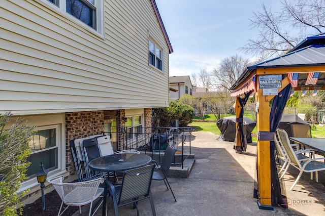 1338 E Best Dr, Arlington Heights, IL 60004 - view of patio / terrace featuring a grill, fence, outdoor dining area, and a gazebo