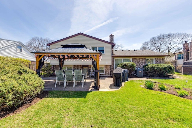 1338 E Best Dr, Arlington Heights, IL 60004 - back of property featuring a gazebo, a patio area, a yard, and brick siding