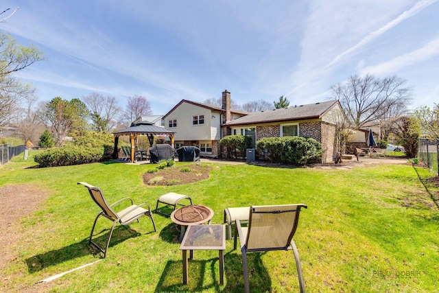 1338 E Best Dr, Arlington Heights, IL 60004 - exterior space featuring a chimney, fence, a gazebo, and a yard