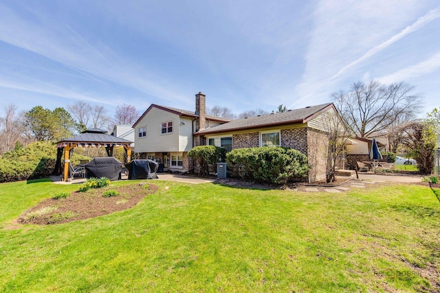 1338 E Best Dr, Arlington Heights, IL 60004 - rear view of house with a patio area, brick siding, a lawn, a chimney, and a gazebo