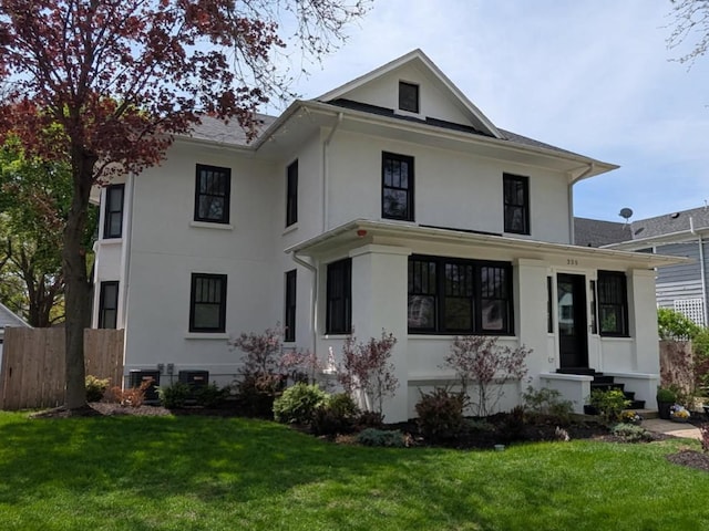 rear view of house with stucco siding