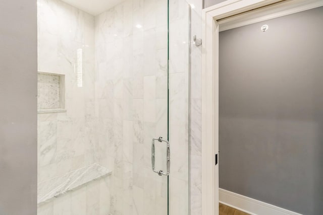 full bathroom with a shower stall