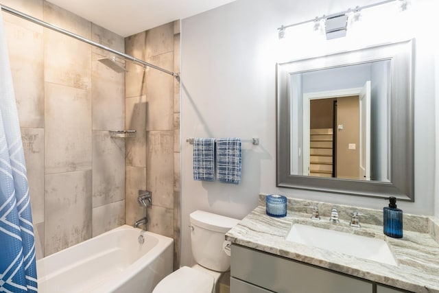 full bath featuring shower / bathtub combination with curtain, toilet, and vanity
