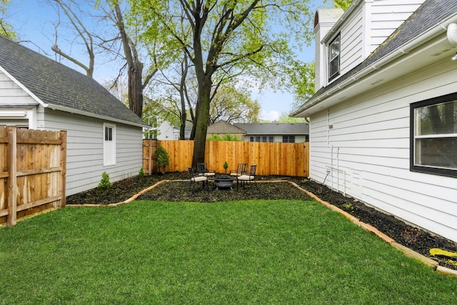 view of yard featuring an outdoor fire pit