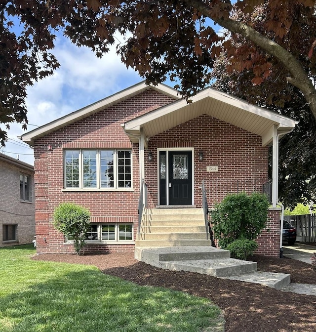 1544 N Wolf Rd, Berkeley, IL 60163 - bungalow-style home with entry steps, brick siding, and a front yard