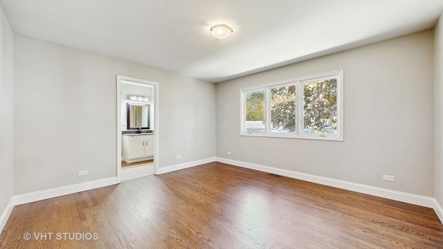 1544 N Wolf Rd, Berkeley, IL 60163 - unfurnished room featuring wood finished floors and baseboards