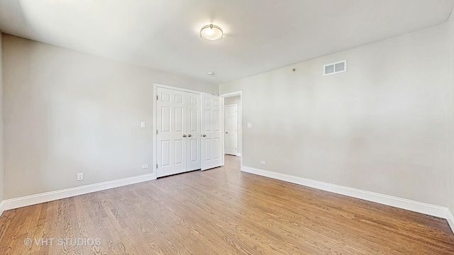 1544 N Wolf Rd, Berkeley, IL 60163 - spare room with baseboards and wood finished floors