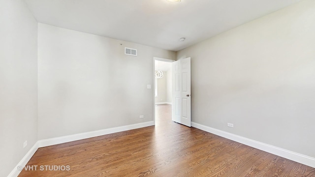 1544 N Wolf Rd, Berkeley, IL 60163 - spare room featuring baseboards and wood finished floors