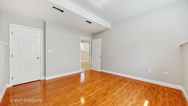 1544 N Wolf Rd, Berkeley, IL 60163 - unfurnished bedroom featuring baseboards