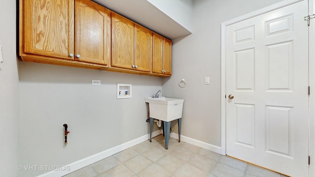 1544 N Wolf Rd, Berkeley, IL 60163 - laundry room with hookup for a washing machine, cabinet space, and baseboards
