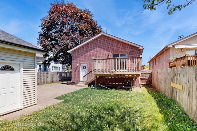 1544 N Wolf Rd, Berkeley, IL 60163 - rear view of house featuring a wooden deck, a patio area, brick siding, and stairs