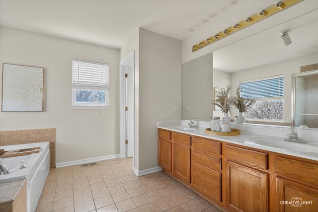 full bathroom with double vanity, visible vents, tile patterned flooring, and a sink