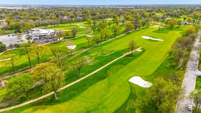 birds eye view of property featuring golf course view
