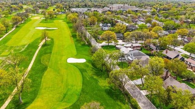 aerial view with view of golf course and a residential view