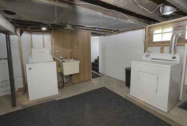 112 W Porter St, Oglesby, IL 61348 - basement featuring independent washer and dryer, stairs, and a sink