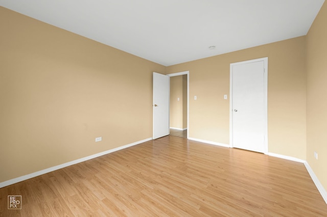 1185 Higgins Quarters Dr Unit 306, Hoffman Estates, IL 60169 - spare room with light wood-style floors, baseboards, and a smoke detector