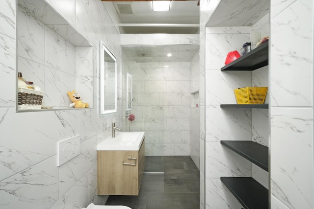bathroom with vanity and a walk in shower