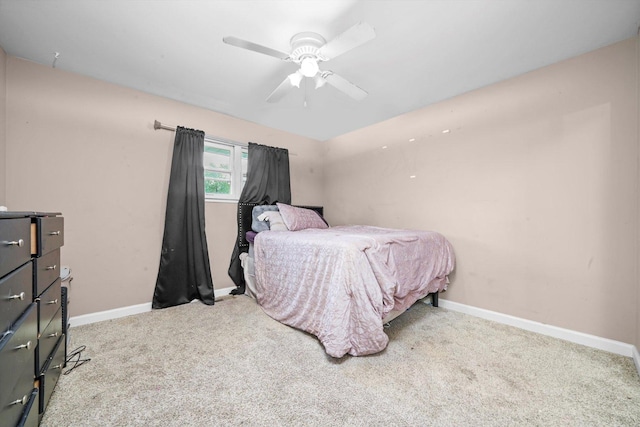 bedroom featuring carpet flooring, baseboards, and ceiling fan