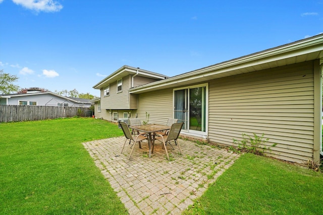 view of yard featuring a patio area and fence