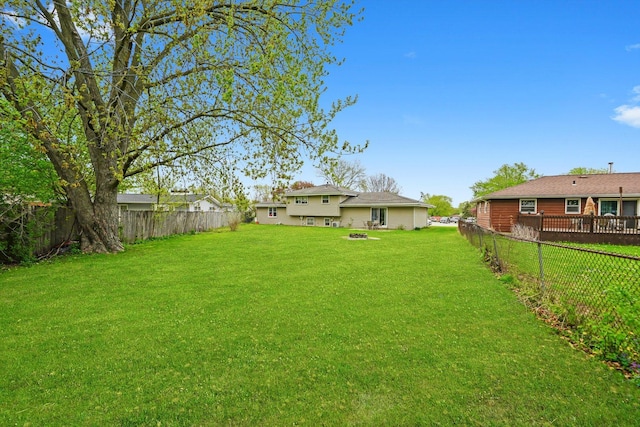 view of yard with a fenced backyard
