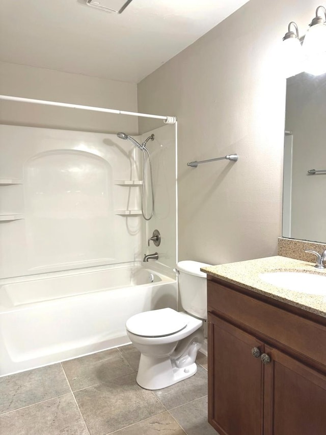 full bath with shower / bath combination, vanity, and toilet