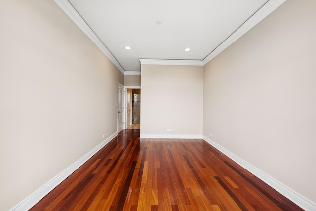 unfurnished room with dark wood finished floors, baseboards, crown molding, and recessed lighting