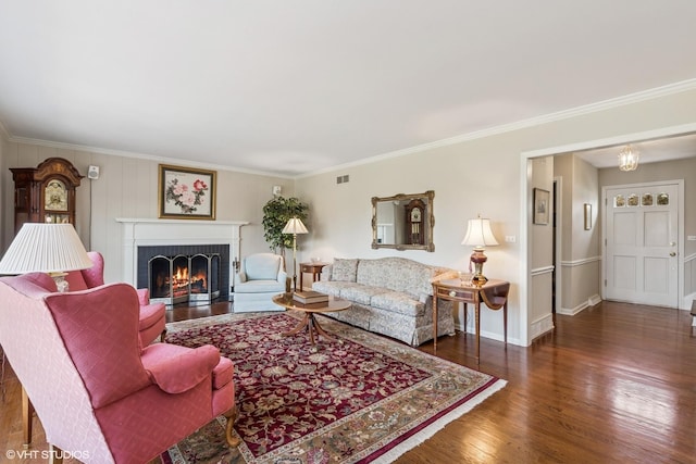 910 Lane, Lorraine, Lake Forest, IL 60045 - living room featuring ornamental molding, a brick fireplace, wood finished floors, and visible vents
