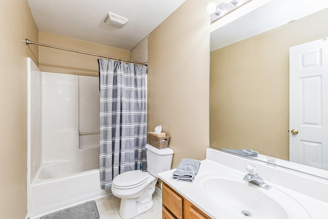 bathroom featuring visible vents, shower / bath combo, tile patterned floors, vanity, and toilet