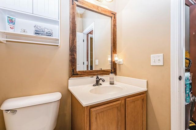 half bath with toilet and vanity