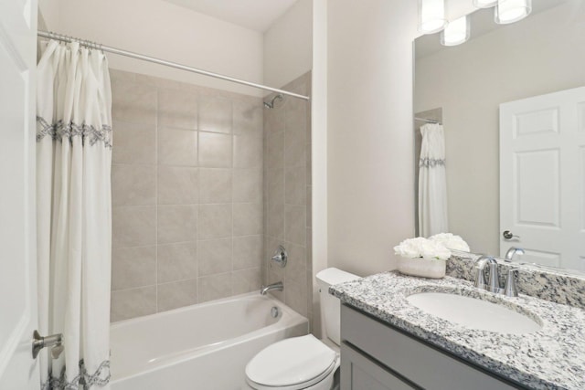 full bathroom with shower / tub combo with curtain, toilet, and vanity