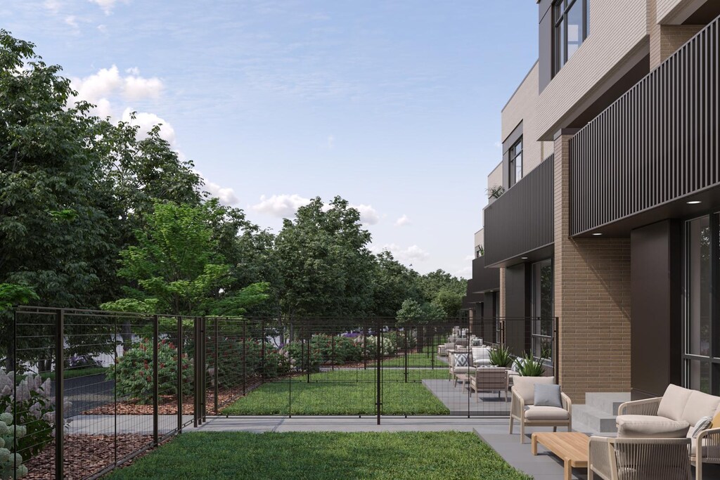 2235 W Oakdale Ave Unit 15-C, Chicago, IL 60618 - view of yard with outdoor lounge area and fence