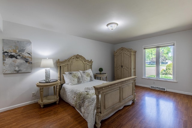 854 Kings Cv, Princeton, IL 61356 - bedroom featuring dark wood finished floors and baseboards