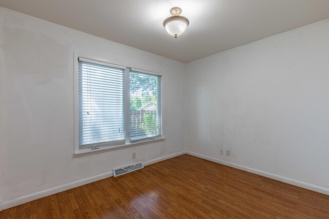 854 Kings Cv, Princeton, IL 61356 - spare room featuring baseboards and wood finished floors