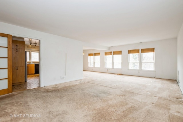 empty room with light carpet