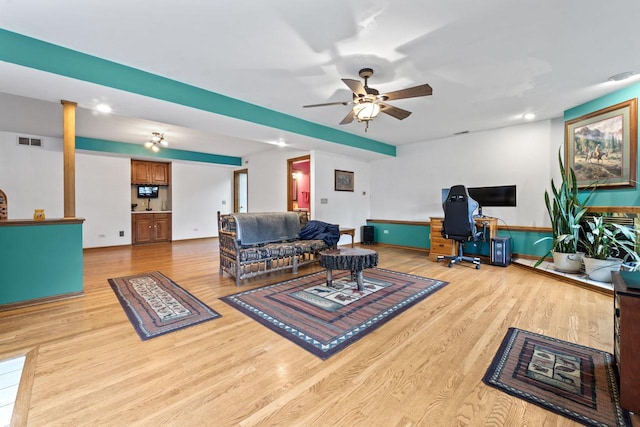 living area featuring recessed lighting, ceiling fan, visible vents, and light wood-type flooring