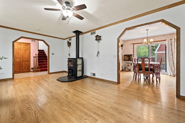 living room with baseboards and light wood-style flooring