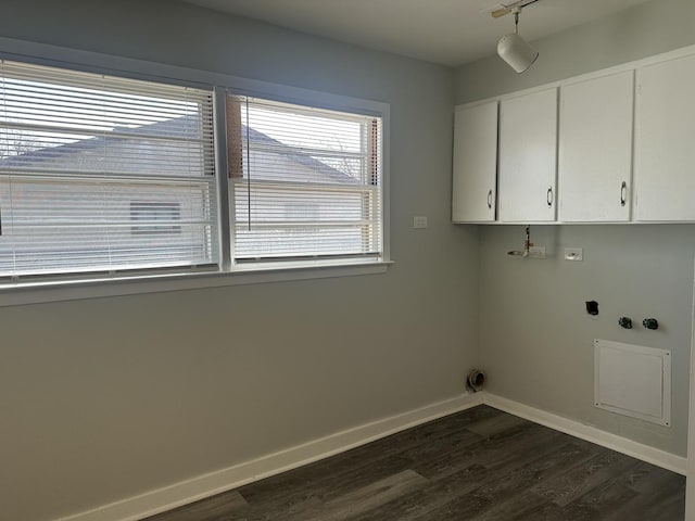 1525 Gordon Ave, Calumet City, IL 60409 - clothes washing area featuring track lighting, cabinet space, dark wood finished floors, baseboards, and washer hookup