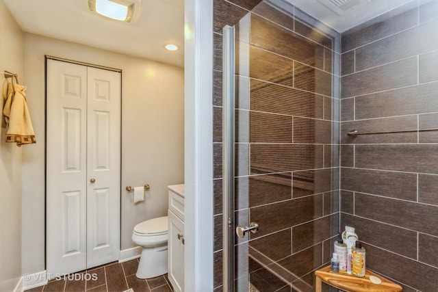 2107 Lawson Blvd, Gurnee, IL 60031 - full bathroom featuring a closet, recessed lighting, a stall shower, and toilet