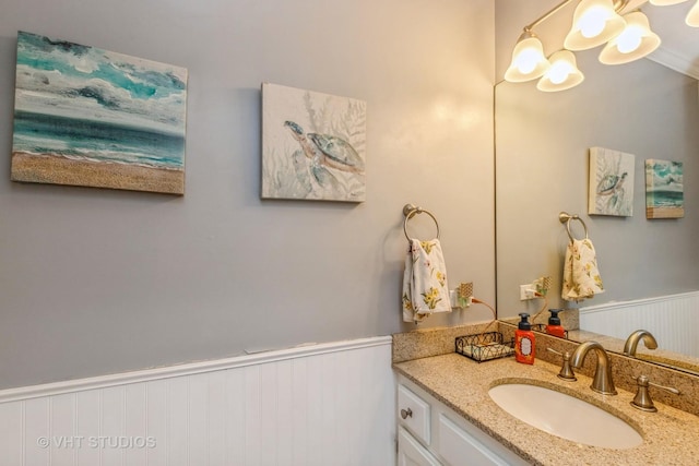 2107 Lawson Blvd, Gurnee, IL 60031 - bathroom with an inviting chandelier, wainscoting, and vanity