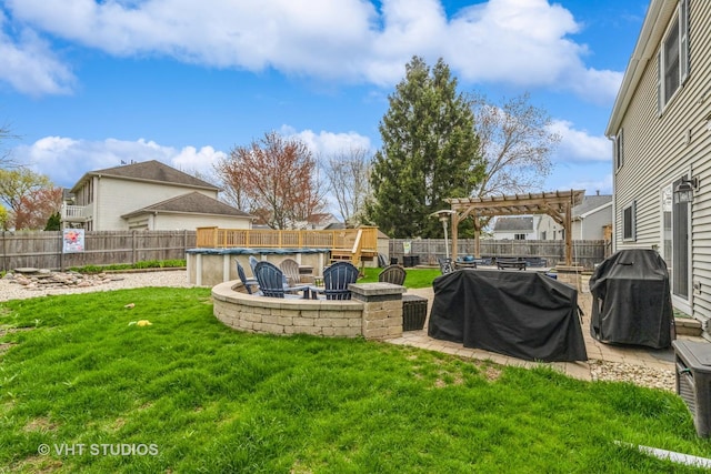 2107 Lawson Blvd, Gurnee, IL 60031 - view of yard featuring a pergola, a fenced backyard, and an outdoor fire pit