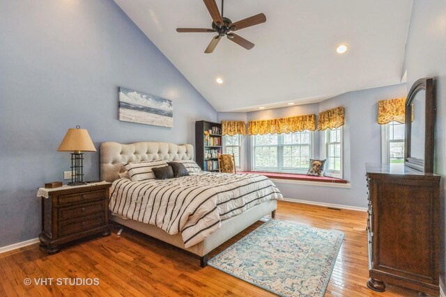 2107 Lawson Blvd, Gurnee, IL 60031 - bedroom with visible vents, baseboards, high vaulted ceiling, recessed lighting, and light wood-style flooring
